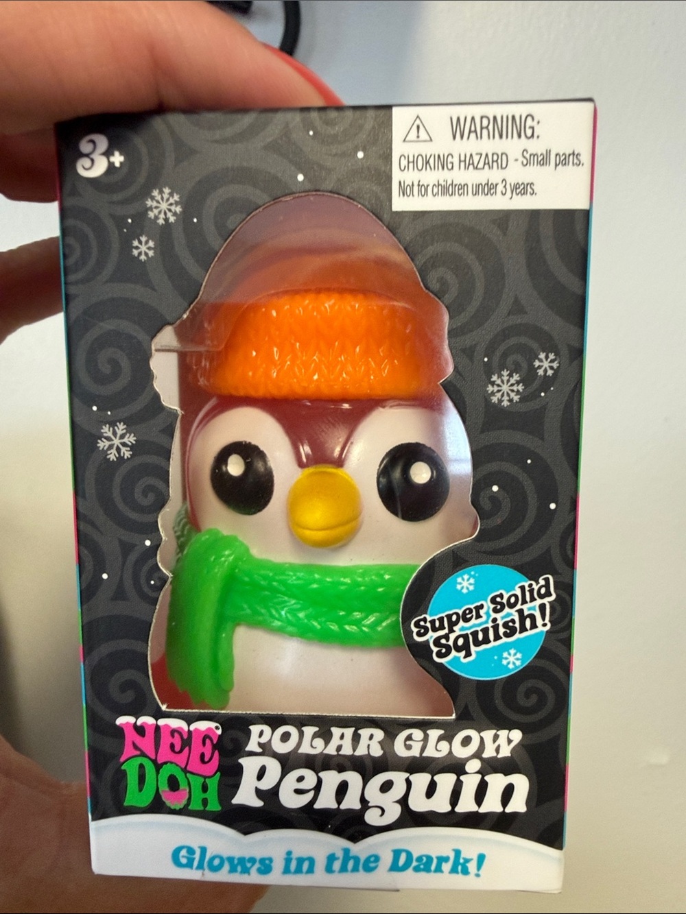 NeeDoh Polar Glow Penguin Squishy Toy - White with Orange Hat & Green Scarf